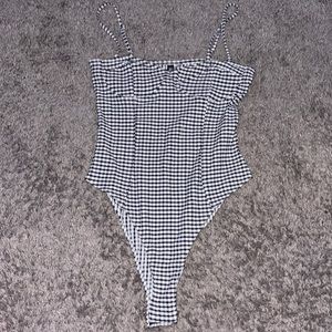 Black and white checkered body suit